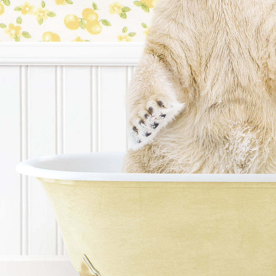 a stuffed bear is sitting in a bathtub