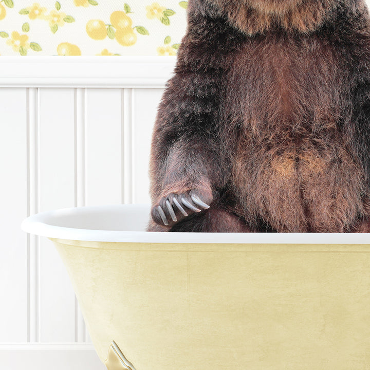 a large brown bear sitting in a bath tub