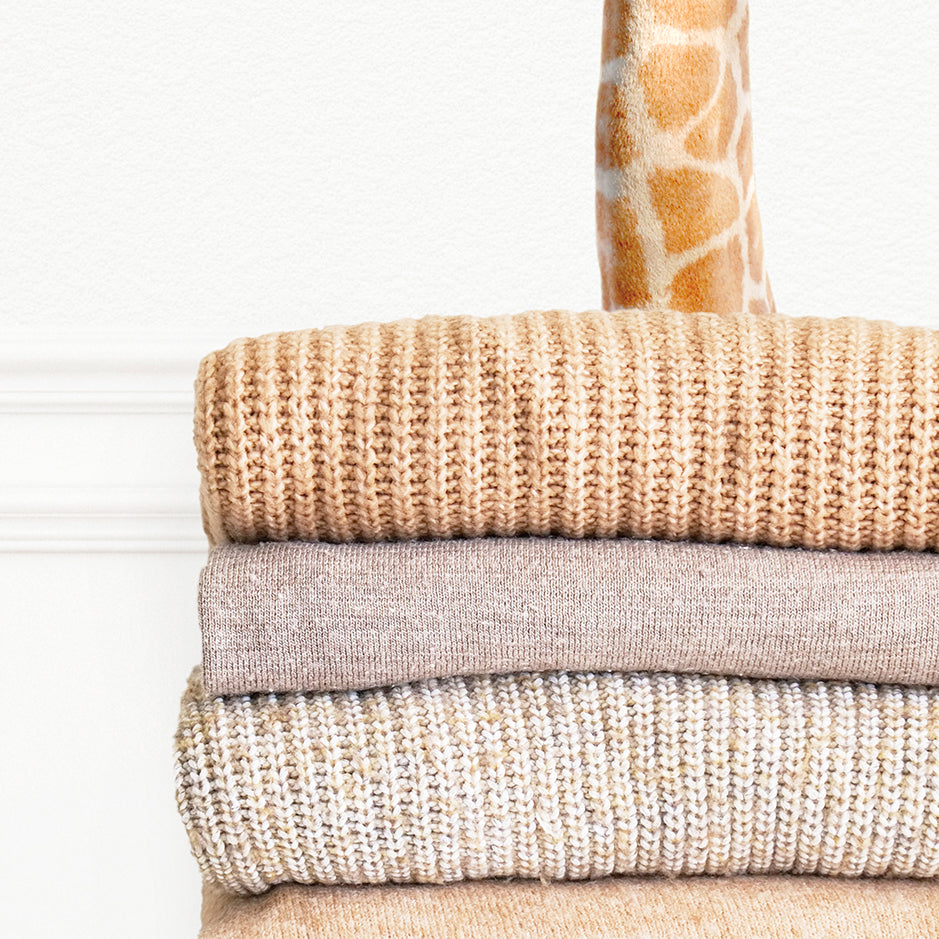 Baby Giraffe on Sweaters - Simple White Wall